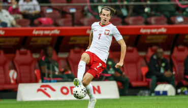 jakub kaminski w trakcie meczu kadry